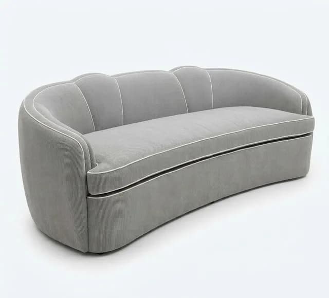 Product photo of a curved grey sofa