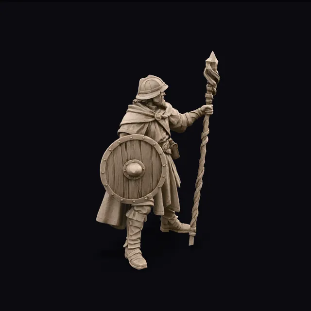 Textured 3D model of a viking warrior figurine with a round shield and staff